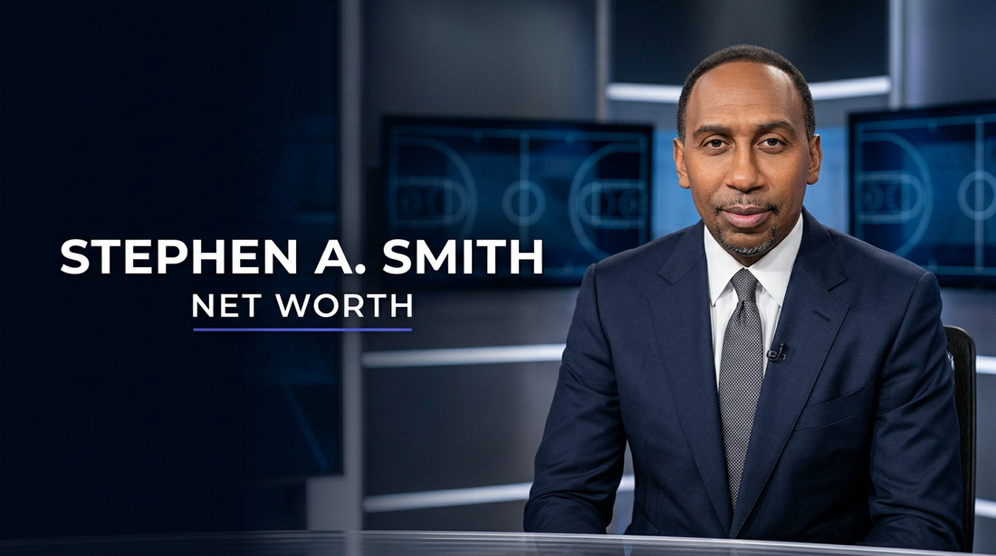 Stephen A. Smith seated at a sports broadcast desk with microphone